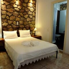 Отель Atalos Suites комната для гостей фото 5