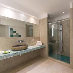 Отель Santorini Secret Suites & Spa ванная фото 3