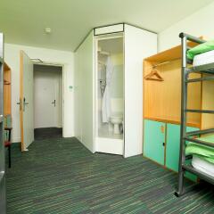 Отель YHA Manchester Кровать в общем номере с двухъярусной кроватью