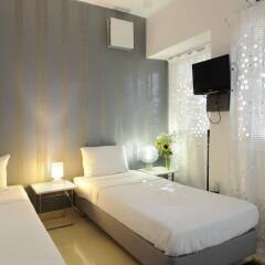 Апартаменты Athens Green Apartments комната для гостей фото 4