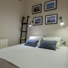 Отель Apartamento Palacio Real IV комната для гостей