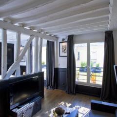 Отель Les Suites Parisiennes Франция, Париж - отзывы, цены и фото номеров - забронировать отель Les Suites Parisiennes онлайн комната для гостей