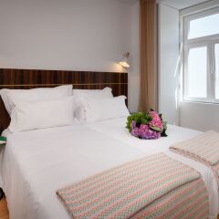 Отель Ouro Grand By Level Residences Лиссабон комната для гостей