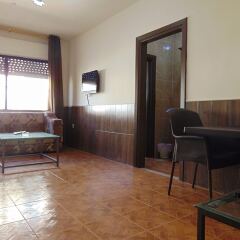 Al-Nujoom Hotel Suites комната для гостей