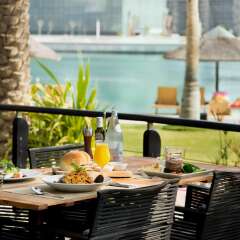 Отель Beach Rotana All Suites питание фото 3