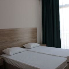 Гостиница на бульваре Надежд, 4-1, кв. 101 в Сочи отзывы, цены и фото номеров - забронировать гостиницу на бульваре Надежд, 4-1, кв. 101 онлайн комната для гостей фото 2