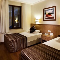 Отель Champion Holiday Village комната для гостей фото 5