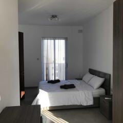 Отель 34 Holiday Suites St Paul's Мальта, Буджибба - отзывы, цены и фото номеров - забронировать отель 34 Holiday Suites St Paul's онлайн комната для гостей фото 3
