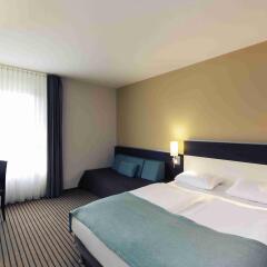 Отель Mercure Hotel München Neuperlach Süd Германия, Мюнхен - 9 отзывов об отеле, цены и фото номеров - забронировать отель Mercure Hotel München Neuperlach Süd онлайн комната для гостей фото 2