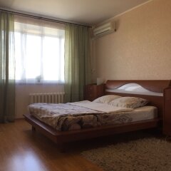 Отель Как дома, квартира на ул. Родионова д. 191 Нижний Новгород комната для гостей