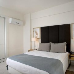 Апартаменты Kusadasi Golf and Spa Apartments Сельчук комната для гостей