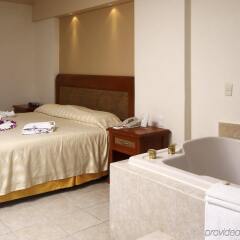 Отель Golden Parnassus All Inclusive Resort & Spa - Adults Only Мексика, Канкун - 2 отзыва об отеле, цены и фото номеров - забронировать отель Golden Parnassus All Inclusive Resort & Spa - Adults Only онлайн комната для гостей фото 2