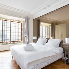 Апартаменты Arc de Triomphe Champs Elysees Apartment комната для гостей фото 3