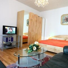 Апартаменты Mozart Apartments Вена комната для гостей фото 5