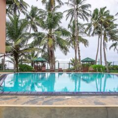 OYO 246 Roy Villa Beach Hotel Галле бассейн
