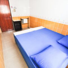 Отель At Home Guest House удобства в номере
