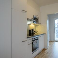 Апартаменты FeelGood Apartments Seestadt Green Living Вена в номере фото 2