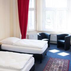 Отель Berliner City Pension Uhlandstrasse Берлин комната для гостей