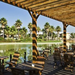Отель PortAventura Hotel Caribe - Theme Park Tickets Included Испания, Салоу - 6 отзывов об отеле, цены и фото номеров - забронировать отель PortAventura Hotel Caribe - Theme Park Tickets Included онлайн приотельная территория
