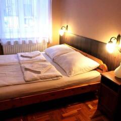Апартаменты Corvin Point Rooms and Apartments комната для гостей