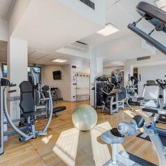 Отель Camplus Living Bononia фитнесс-зал фото 3