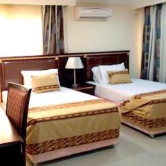 Отель Beni Apartment And Suites Нигерия, Лагос - отзывы, цены и фото номеров - забронировать отель Beni Apartment And Suites онлайн комната для гостей фото 2