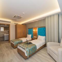 Grand Palace Hotel комната для гостей