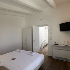 Отель Iulius Suite & spa Конверсано в номере