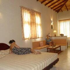 Отель Oasey Beach Resort Бентота комната для гостей