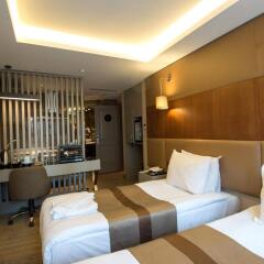 Отель GK Regency Suites комната для гостей фото 5