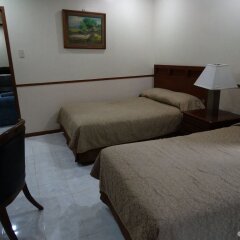 Отель Garden Plaza Hotel Филиппины, Манила - отзывы, цены и фото номеров - забронировать отель Garden Plaza Hotel онлайн комната для гостей фото 3