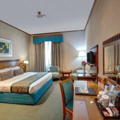 Отель Golden Tulip Al Barsha комната для гостей фото 2