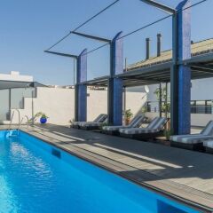 AC Hotel Ciudad de Sevilla by Marriott бассейн фото 3