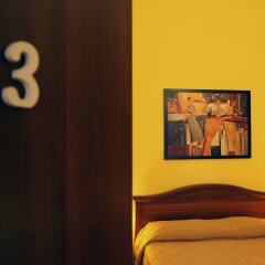 Отель B&B Carlo Felice сейф в номере