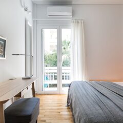 Отель UPSTREET Adorable 2BD Apt near Kallimarmaro Stadium Греция, Афины - отзывы, цены и фото номеров - забронировать отель UPSTREET Adorable 2BD Apt near Kallimarmaro Stadium онлайн комната для гостей фото 4