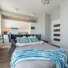 Апартаменты WarsawLiving - Cybernetyki Apartments комната для гостей