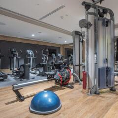Отель Radisson Blu Hotel & Residences, Zakopane Польша, Закопане - 1 отзыв об отеле, цены и фото номеров - забронировать отель Radisson Blu Hotel & Residences, Zakopane онлайн фитнесс-зал фото 3