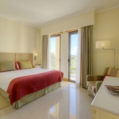 Отель The Residences at Victoria by Tivoli комната для гостей