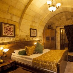 Отель Kayakapi Premium Caves Cappadocia комната для гостей фото 3