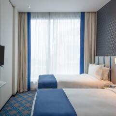 Отель Holiday Inn Express Singapore Katong комната для гостей фото 5