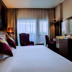 Отель Grand Mercure Yogyakarta Adi Sucipto Индонезия, Слеман - отзывы, цены и фото номеров - забронировать отель Grand Mercure Yogyakarta Adi Sucipto онлайн комната для гостей фото 2