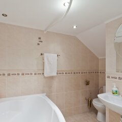 Апартаменты SutkiMinsk Apartment Минск ванная