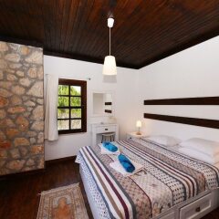 Villa Sedir by Akdenizvillam Турция, Патара - отзывы, цены и фото номеров - забронировать отель Villa Sedir by Akdenizvillam онлайн комната для гостей фото 5