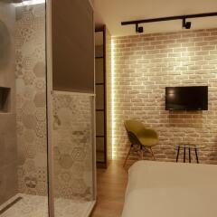 Отель Level Luxury Suites комната для гостей фото 3