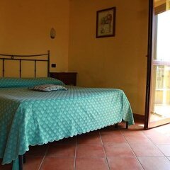 Отель Poggio Del Sole Country House Италия, Ситта-Сант-Анджело - отзывы, цены и фото номеров - забронировать отель Poggio Del Sole Country House онлайн комната для гостей фото 2