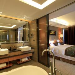 Zhangjiagang Zhonglian GDH International Hotel ванная фото 2