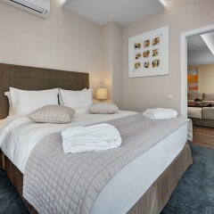 Апартаменты Apartments by Palmira Business Club комната для гостей фото 3