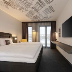 Отель V8 Hotel Koln @MOTORWORLD, an Ascend Hotel Collection Member Германия, Кёльн - отзывы, цены и фото номеров - забронировать отель V8 Hotel Koln @MOTORWORLD, an Ascend Hotel Collection Member онлайн комната для гостей фото 2