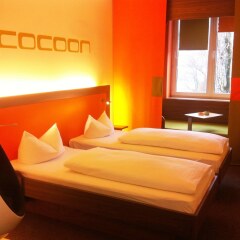 Отель Cocoon Германия, Мюнхен - отзывы, цены и фото номеров - забронировать отель Cocoon онлайн комната для гостей фото 5