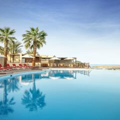 Отель The Cove Rotana Resort бассейн фото 6